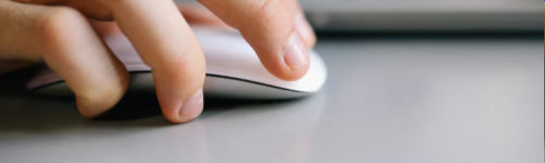 hand clicking a computer mouse